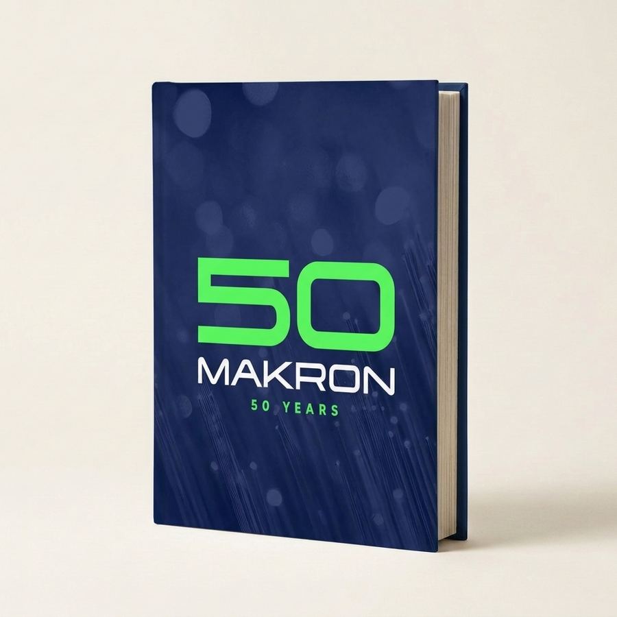 Makron 50 vuotta -historiikin kansi